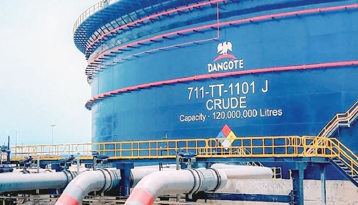 Dangote Refinery facility with fuel storage tanks as petrol prices drop in response to global oil market changes.