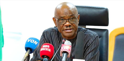 Nyesom Wike addressing Rivers State lawmakers amid defections to the APC.