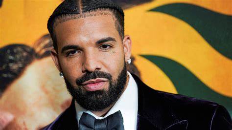 Canadian rapper Drake {Photo Credit: Google}  