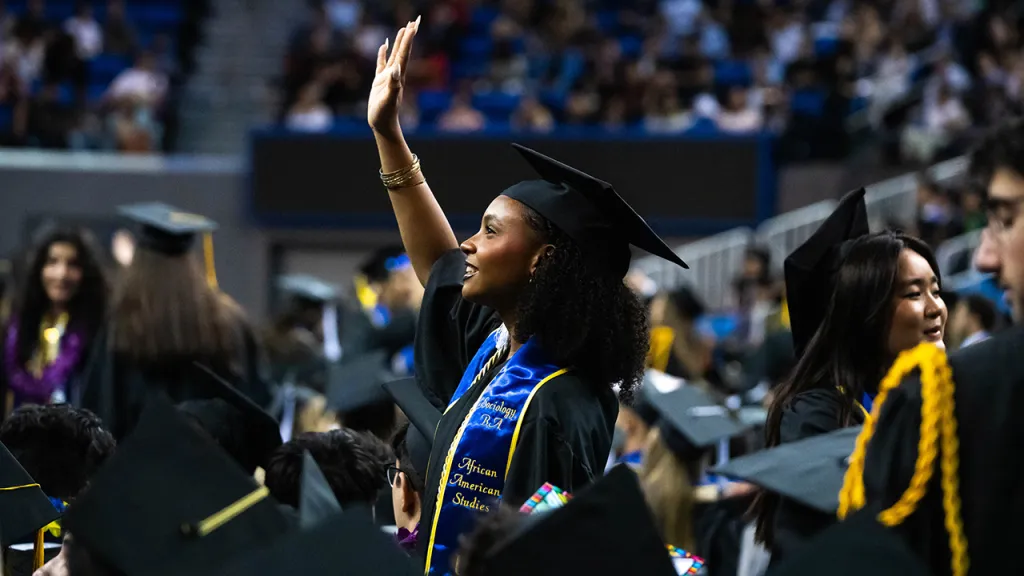Students look for family and friends during UCLA’s commencement ceremony on June 16, 2023. (Sarah Reingewirtz/MediaNews Group/Los Angeles Daily News via Getty Images)