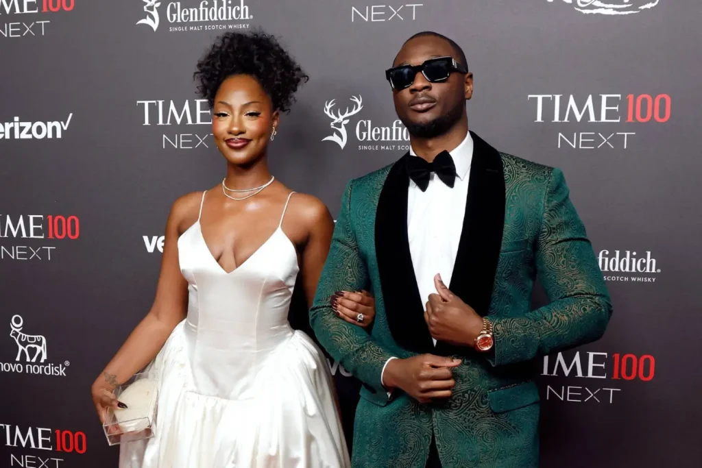 Tems and Manager Muyiwa Awoniyi.