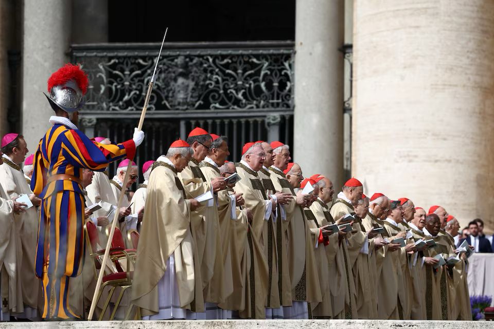 Following Pope Francis’ death, global Roman Catholics begin speculating on his successor among the red-robed cardinals, as announced by the Vatican.