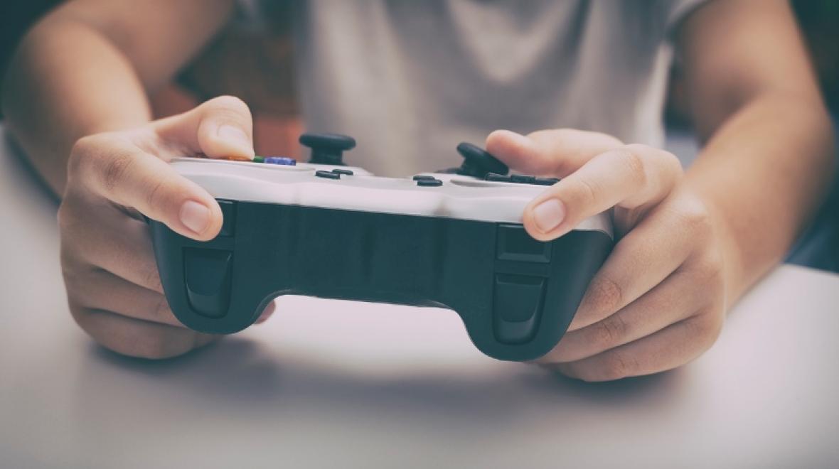 A youngstar playing video games