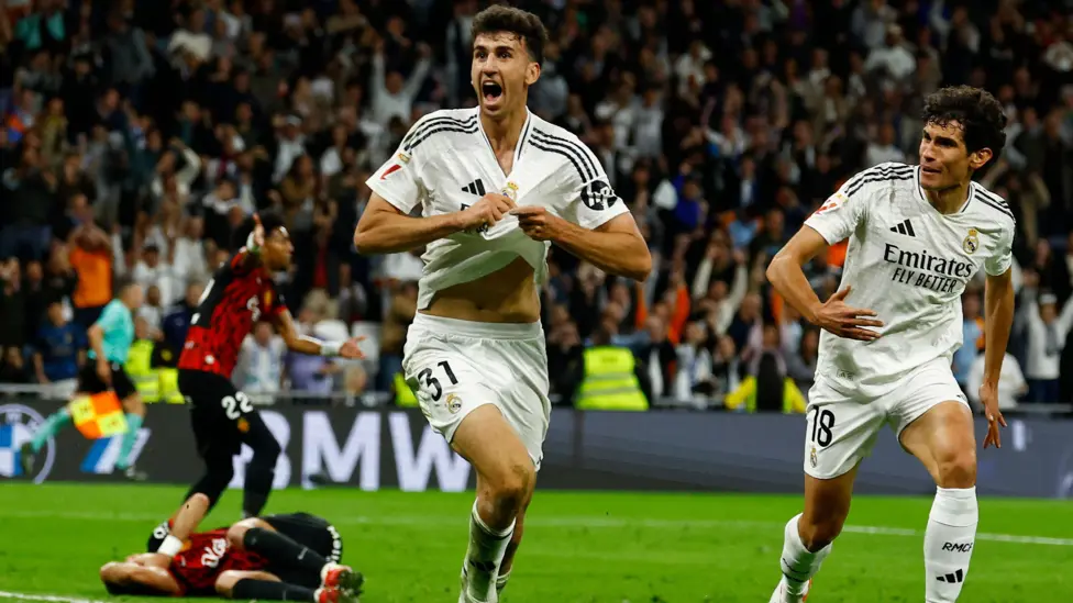 Jacobo Ramon's 95th-minute winner for Real Madrid delays Barcelona's La Liga title celebrations; Barça need just a point vs Espanyol to clinch the crown.