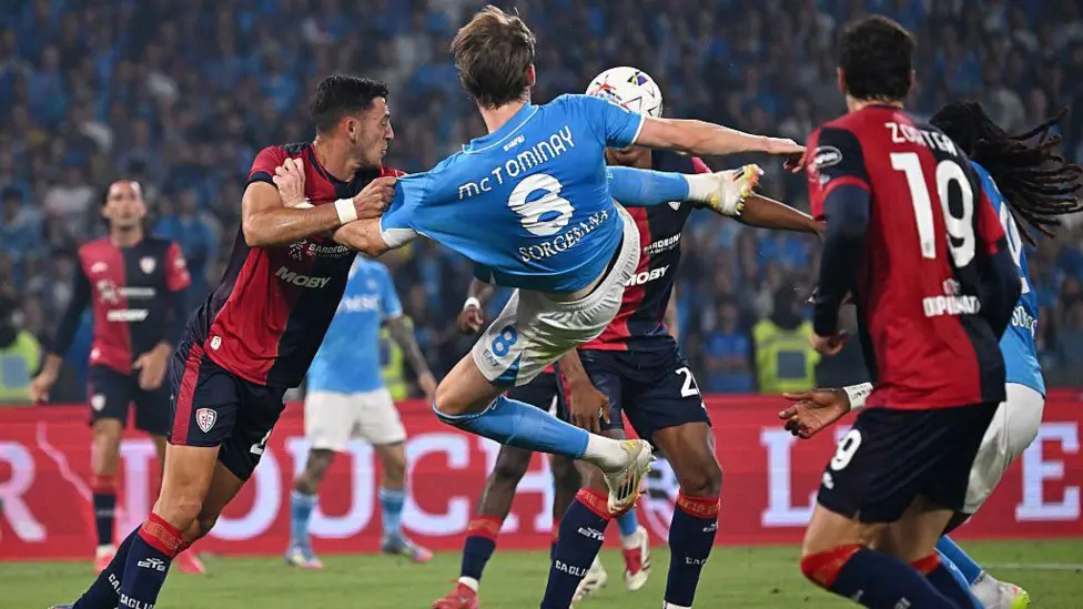 Napoli win Serie A after 2-0 vs Cagliari. McTominay scores stunner, Lukaku seals it. Title joy for Conte, first Scots champs since 1905.