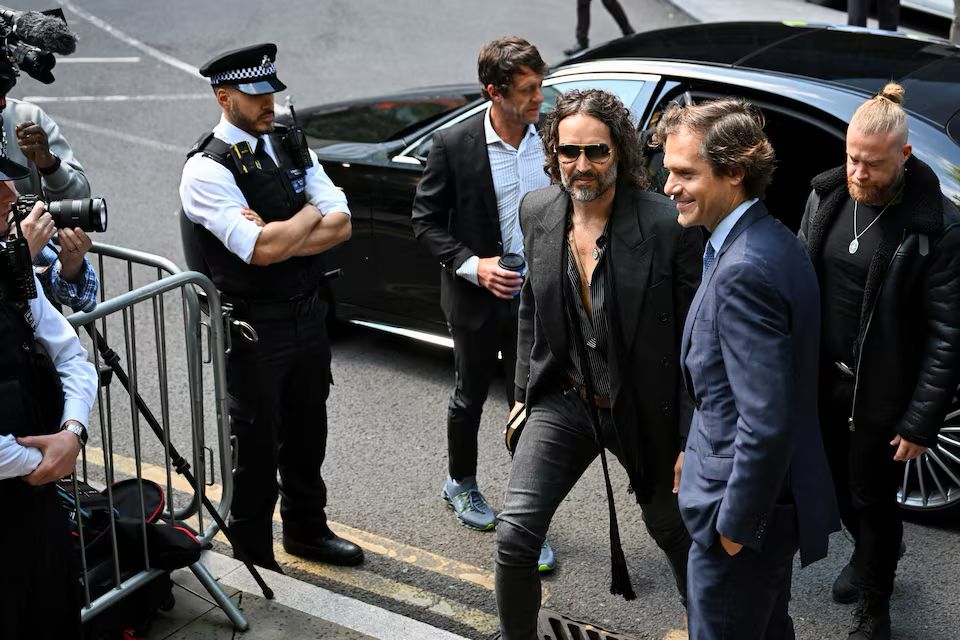 Russell Brand at UK court premises
