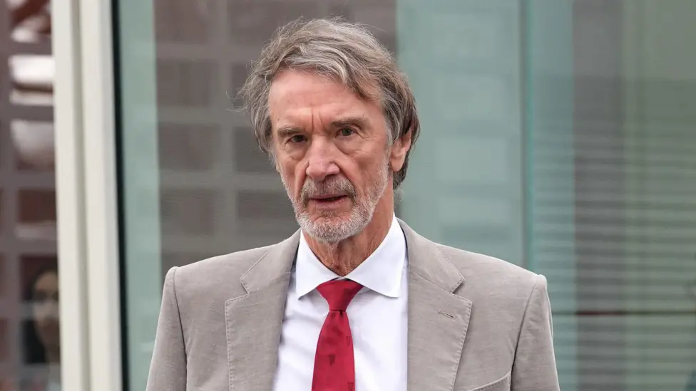 Jim Ratcliffe loses £6.5bn in a year as Ineos faces pressure; Man Utd fans criticise cuts and price hikes while stadium plans and Europa hopes remain.