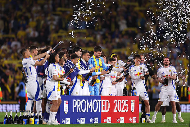 Solomon's stoppage-time winner seals Leeds' dramatic title win over Burnley as both sides finish on 100 points in a historic Championship season.