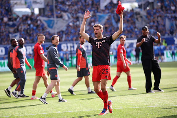 Bayern thrash Hoffenheim 4-0 as Müller bids farewell in final game. Olise, Kimmich, Gnabry & Kane score; champs finish 13 pts clear in Bundesliga.