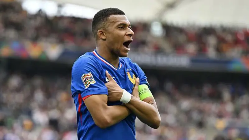 Mbappé scores 50th France goal and assists Olise as France beat Germany 2-0 to finish third in Nations League; VAR denies hosts twice in Stuttgart.