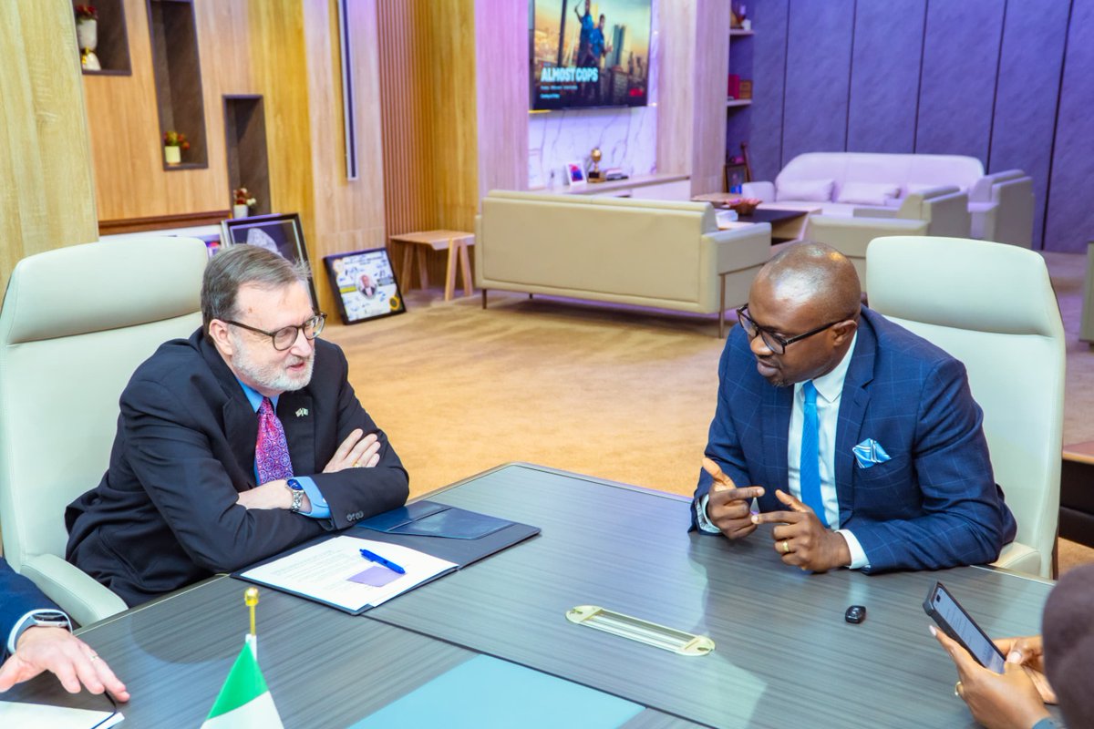 Minister of Interior, Olubunmi Tunji-Ojo discussing with the United States Ambassador to Nigeria, Richard Mills
