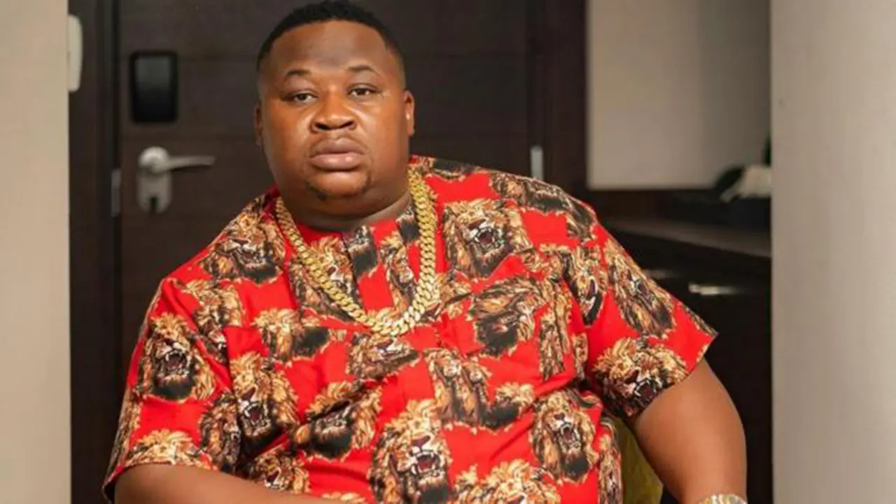 Cubana Chief Priest says he will miss Davido’s wedding after being denied US visa.