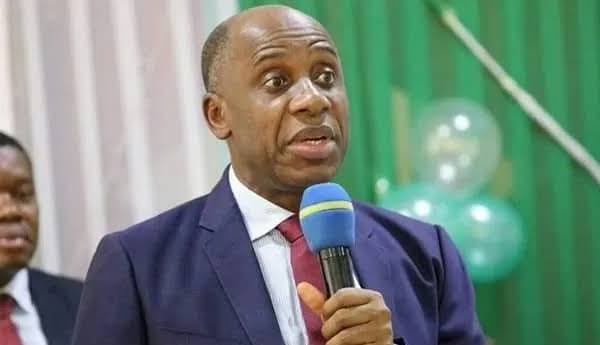 Rotimi Amaechi speaking at a political event in Abuja.