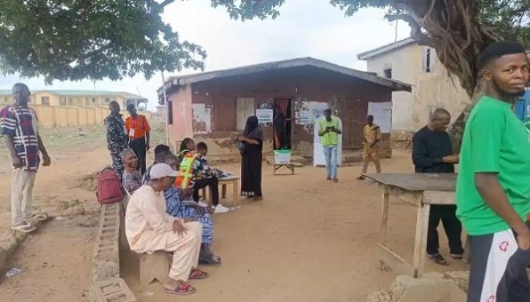 INEC officials set up polling station in Ibadan North by-election amid low voter turnout and delayed arrivals.