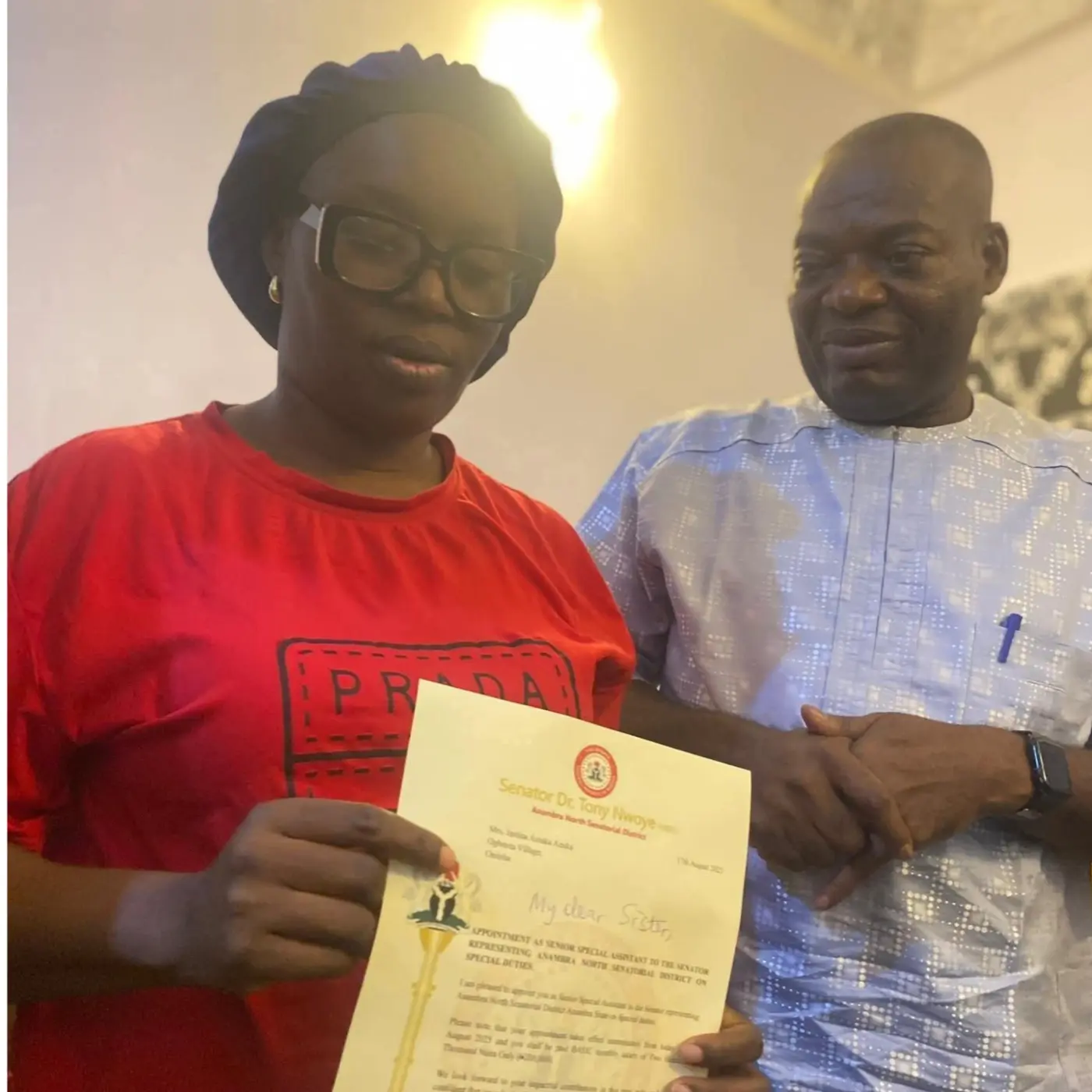 Senator Tony Nwoye hands appointment letter to Justina Azuka after her by-election loss