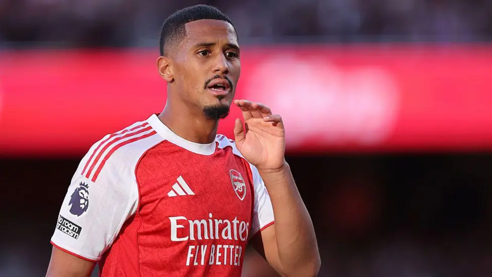 Arsenal’s William Saliba agrees new five-year deal to stay until 2030, ending Real Madrid interest and securing his future under Mikel Arteta.