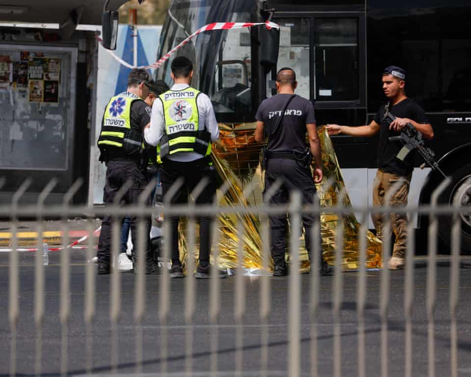 Six dead, 12 injured in Jerusalem bus stop shooting