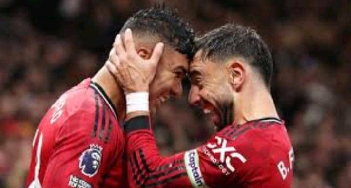 Manchester United players celebrating their goal