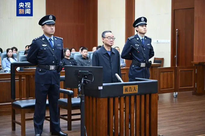 China's former agriculture minister Tang Renjian sentenced to death with reprieve for $38M bribery in Xi Jinping's anti-corruption crackdown.