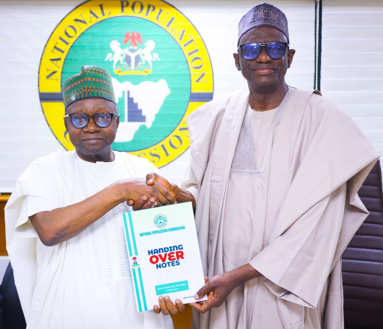 Outgoing NPC Chairman Nasir Kwarra hands over leadership to Acting Chairman Muhammad Dattijo during a ceremony at the Commission’s headquarters in Abuja.