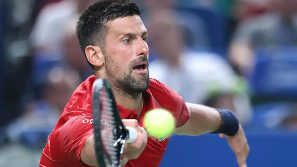 Djokovic survives Cilic in Shanghai Masters, winning 7-6, 6-4; veteran clash highlights intensity, with Djokovic into the third round vs Hanfmann.