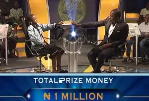 Who wants to be a millionaire. L-R Contestant and host Frank Edoho
