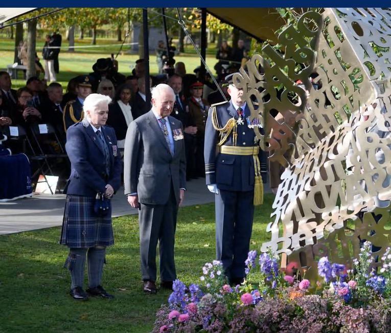 King Charles at the burial with his flowers