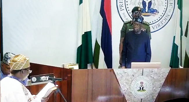 Joash Amupitan being sworn in by President Tinubu on Thursday