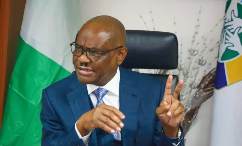 FCT Minister Nyesom Wike speaking to reporters about APC victories in the FCT Area Council elections and Rivers State by-election.