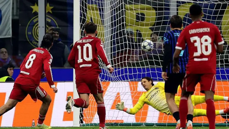 Szoboszlai’s late penalty gives Liverpool a vital 1-0 win at Inter, ending their 19-game home run and lifting the Reds into the Champions League top eight.