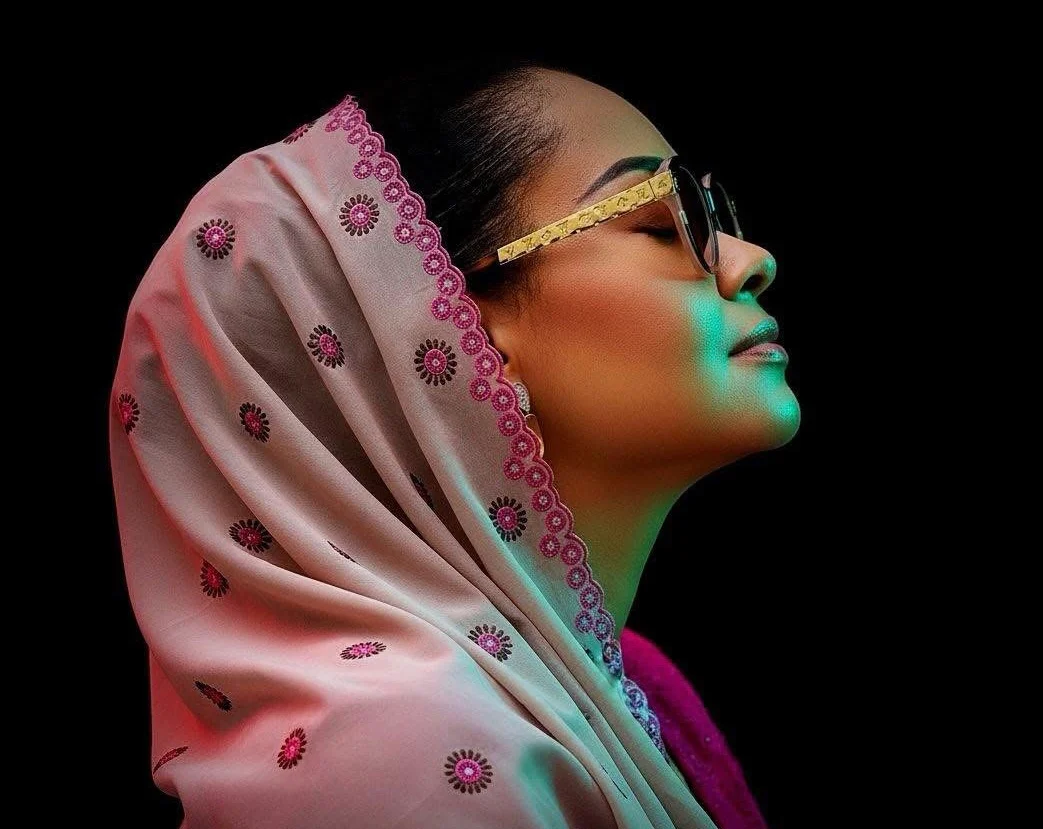 Senator Natasha Akpoti-Uduaghan at a school inauguration, smiling and interacting with students during legacy project activities.