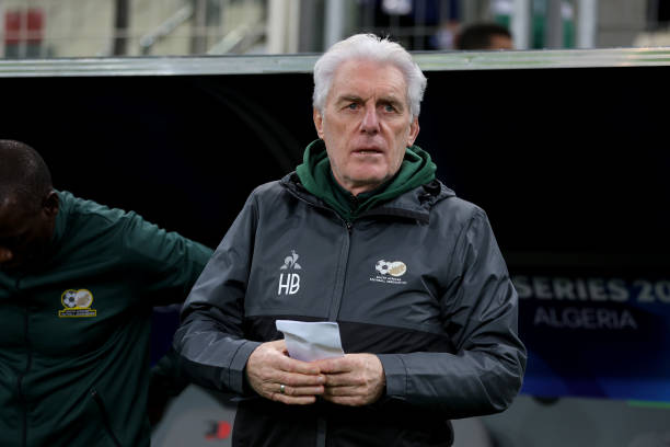 **AFCON 2025: Hugo Broos Unveils South Africa’s Final 25-Man Squad for Morocco** Bafana Bafana head coach Hugo Broos has officially released his final 25-man squad for the 2025 Africa Cup of Nations (AFCON), marking the end of weeks of anticipation following the announcement of an unusually large 55-man provisional list. With the continental tournament set to kick off later this month in Morocco, Broos has opted for a well-balanced mix of experience, proven performers, and emerging stars. The final selection reflects the stability and cohesion that carried South Africa to a memorable bronze-medal finish at AFCON 2023, while also showcasing the coach’s willingness to reward form players and promising youngsters who have excelled at club level both at home and abroad. ### **Continuity at the Core** One of the standout features of Broos’ squad is his trust in the group that brought South Africa back to the continental spotlight in 2023. Key figures such as Ronwen Williams, Teboho Mokoena, Khuliso Mudau, and Evidence Makgopa maintain their places, providing leadership and tournament experience vital for navigating the pressures of AFCON. Broos has consistently emphasised the importance of continuity, insisting that maintaining a stable spine is crucial for long-term success. The selected squad underlines his philosophy, ensuring understanding and chemistry remain strengths for Bafana Bafana. ### **Emerging Talents Break Through** The 2025 AFCON squad also highlights a new generation of South African talent making waves in domestic and international competitions. Rising stars like Relebohile Mofokeng (Orlando Pirates), Shandre Campbell (Club Brugge), and Tylon Smith (QPR) have earned their places on the back of standout performances. Their inclusion signals the national team’s continued evolution, blending youthful energy with established maturity. Broos has often praised young players who show consistency and boldness in their performances, and this squad reflects that philosophy. ### **Strong Defensive Depth** At the back, Broos has opted for a well-rounded defensive unit featuring a combination of PSL stalwarts and Europe-based defenders. The likes of Siyabonga Ngezana, thriving at Romanian club FCSB, and Samukelo Kabini of Norway’s Molde FK bring valuable exposure to international football. Khuliso Mudau and Aubrey Modiba, both from Mamelodi Sundowns, continue to anchor the full-back positions, offering both defensive solidity and attacking thrust from wide areas. ### **Midfield Balance and Versatility** The midfield department boasts a familiar core, headlined by Sundowns duo Teboho Mokoena and Bathusi Aubaas. Their experience and control in the heart of the pitch are expected to be central to Bafana’s plans. Thalente Mbatha (Orlando Pirates) and Portugal-based Sphephelo Sithole add dynamism and depth, giving Broos multiple options for tactical variations throughout the tournament. ### **Potent Attack Led by Foster and Mofokeng** In attack, the squad features a mix of pace, creativity, and physical presence. Burnley striker Lyle Foster is widely expected to lead the line, supported by the likes of Evidence Makgopa, Oswin Appollis, and Relebohile Mofokeng, who continues to rise as one of South Africa’s brightest attacking prospects. The overseas-based duo of Mohau Nkota (Al-Ettifaq) and Elias Mokwana (Al Hazem) add further flair and unpredictability to South Africa’s forward options. ### **Group B Challenges Await** South Africa have been drawn into a competitive Group B alongside Angola, Egypt, and Zimbabwe. Bafana will open their campaign on **22 December against Angola**, followed by a crucial clash with African giants **Egypt on 26 December**, before concluding group action against **Zimbabwe on 29 December**. With preparations set to begin on 8 December, Broos and his squad will look to finalise tactical setups during their training camp in Morocco. Expectations are high, as the team aims to build on their 2023 success and challenge for a second continental crown—the first since their historic triumph in 1996. As AFCON 2025 approaches, South Africa’s blend of experience, talent, and renewed ambition sets the stage for what could be another unforgettable chapter in Bafana Bafana’s storied history.