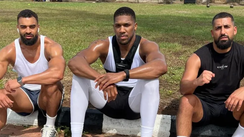 Anthony Joshua’s driver has been charged after a Nigeria crash killed two team members. Joshua was injured but discharged; case adjourned to 20 January.